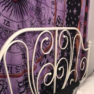 Full sized white metal bed frame